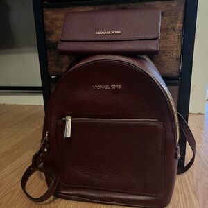 LIKE NEW Michael Kors backpack and matching wallet